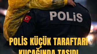 Polis küçük taraftarı kucağında taşıdı